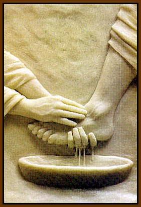 Detail of relief carving of washing feet - icon for service
